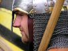 Military History - Norman Warrior's helmet with nose protection and chain mail carrying spear